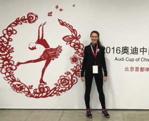 Kate Hamilton, PT, DPT working as a physical therapist for figure skaters at the Cup of China.