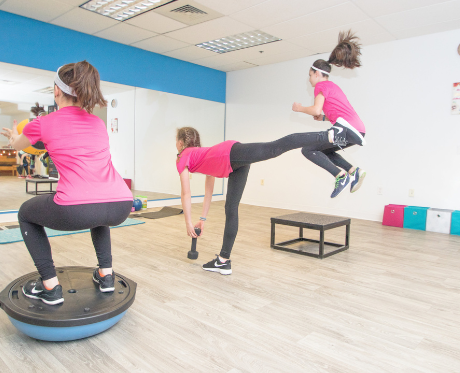 Small group strength and fitness class at Girl Fit. 